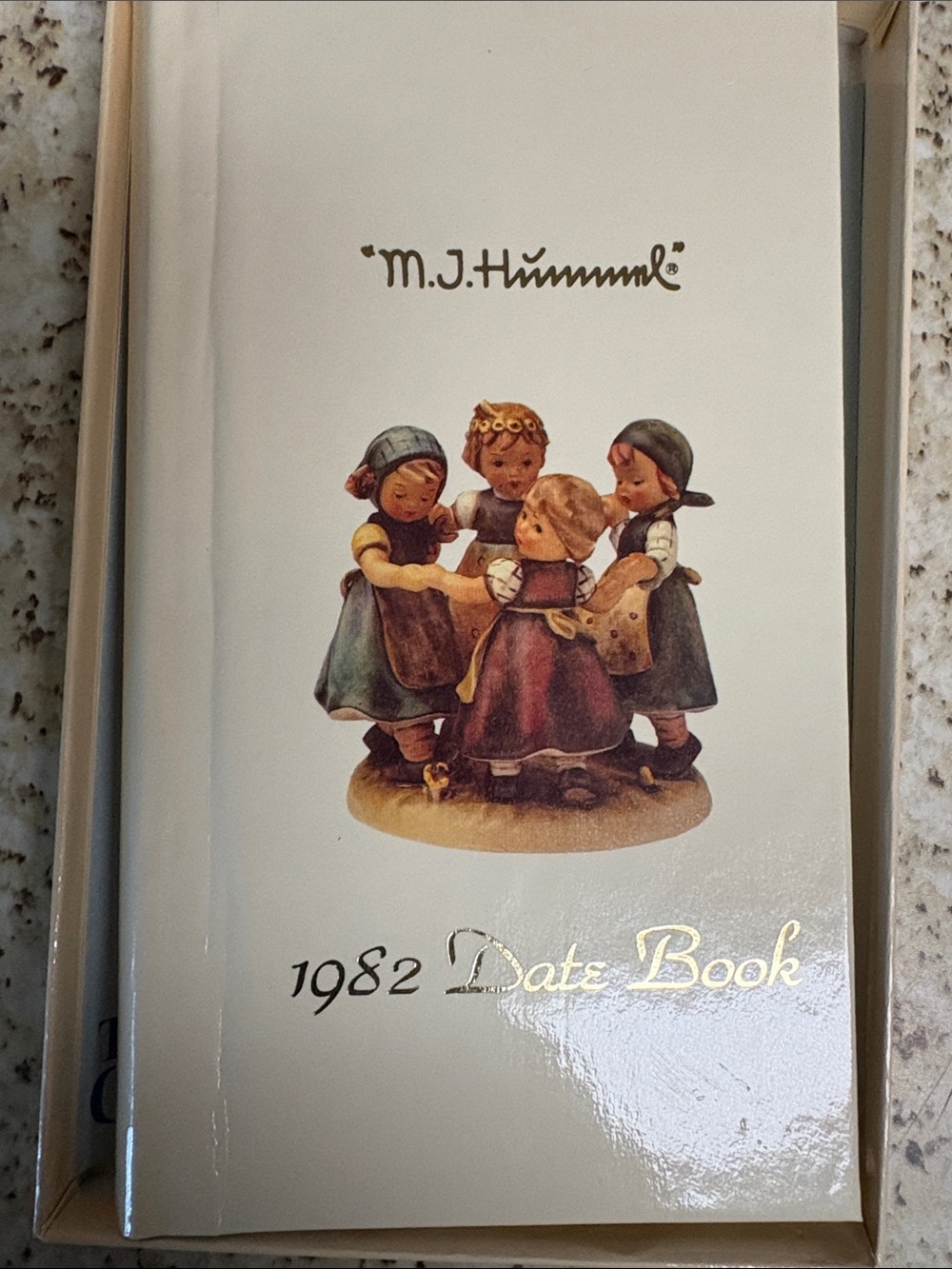Hummel Cream Cover 1982 Date Book with Silver & Black Plaque